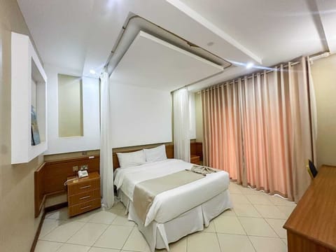 Deluxe Double Room, Balcony, City View | Free WiFi, bed sheets