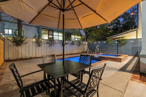 Pool area at twilight under the umbrella