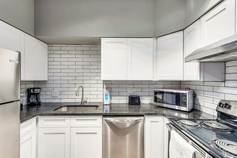 Living Room / Dining Room combo with Fully stocked kitchen