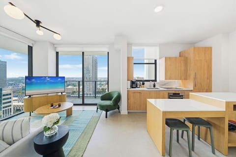 This bright, modern retreat boasts wall-to-wall, floor-to-ceiling glass, connecting the interior to the vibrant Miami skyline. Whether you're cooking, dining, or relaxing on the sofa, you'll enjoy an uninterrupted panoramic view