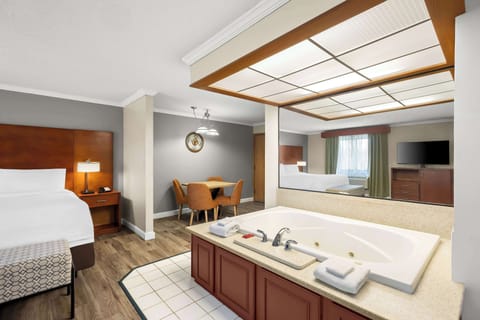 Suite, 1 King Bed, Non Smoking, Jetted Tub (with Sofabed) | Premium bedding, in-room safe, desk, laptop workspace