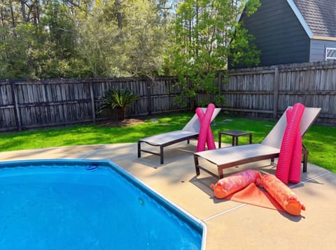 Splash All Day in Your Private Fenced Pool,  relax in lounge chairs &  watch kids play with the  pool toys provided! 