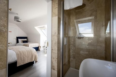 Family Room, Sea View | Blackout drapes, soundproofing, iron/ironing board, free WiFi