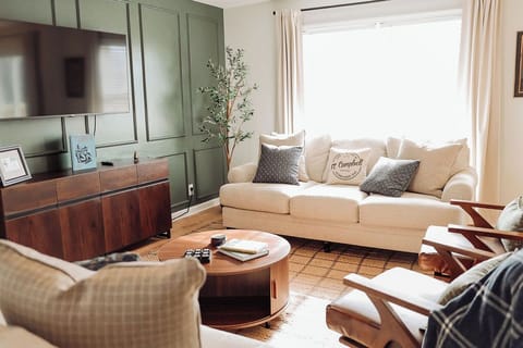 Spacious living room designed for family gatherings and extended stays near Fort Campbell