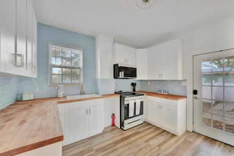 Sunlight soaked kitchen with new appliances