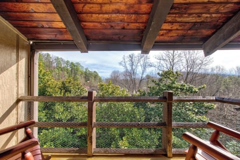Step onto your private covered balcony and breathe in the fresh air while enjoying peaceful views of lush greenery and rolling hills.