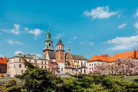 Stroll through historic squares with iconic skyline views nearby.
