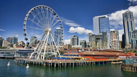 Explore the waterfront boardwalk with sparkling bayfront city views.