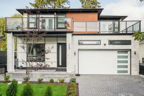 Executive 4 bedroom residence with private parking and modern design.