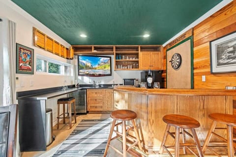 Beautiful Oak Bar and Dart Board.  Karaoke machine included!