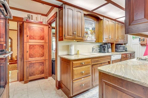 Kitchen | Rich Wood Cabinetry & Granite Counters