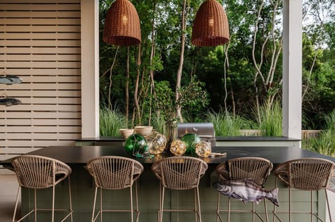 Balcony | Lower Level | Outdoor Dining Area | Cornhole Setup