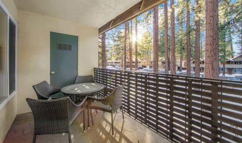 Cozy balcony patio seating for fresh air and downtime