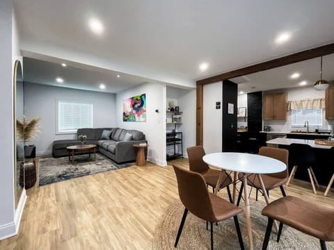 Open living area flowing into dining space, ideal for gathering, dining, and relaxing together