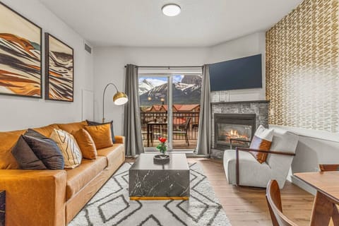 Enjoy the stunning mountain views from the comfort of your living room.