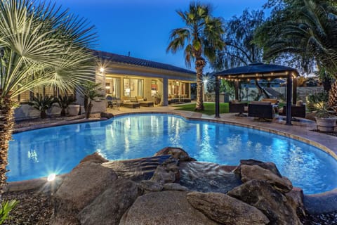 Lovely 5 BR, 3.5 BA DREAM CATCHER in popular Power Ranch Community features a heated pool, waterfall, covered patio and propane fire table.