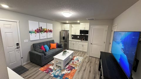 Great Room includes Kitchenette, 65" 4K TV, streaming services, 1GB Internet