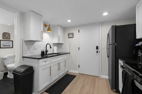 Stylish, well-appointed kitchen with modern appliances, sleek finishes, and smart storageâdesigned for easy cooking and everyday comfort.