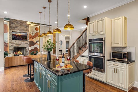 Gather around the island for meals and conversation ✨