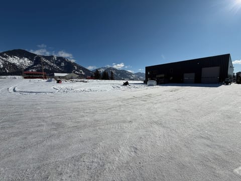 Flat driveway with plenty of parking.