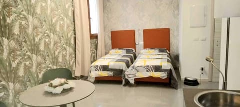 Double or Twin Room, Kitchenette | In-room safe, blackout drapes, free WiFi