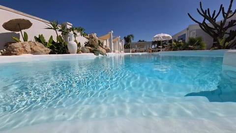 Seasonal outdoor pool, pool umbrellas, sun loungers