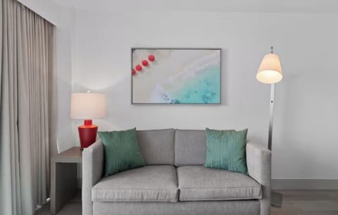 Curl up on the sofa with soft lighting and coastal calm.