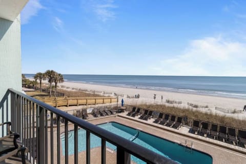 Sip coffee on the balcony with endless ocean views.