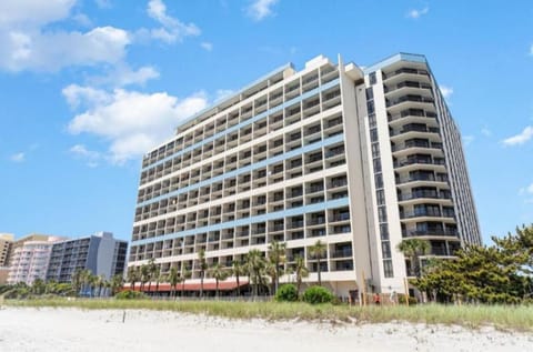 Arrive at a bright beachfront tower made for vacations.