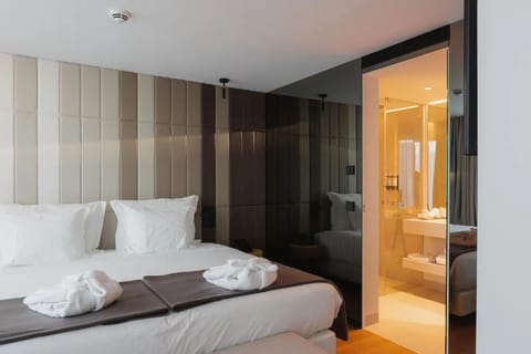 Drift off in crisp linens with a spa-style ensuite.