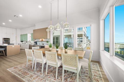 10-seat dining table is right off the kitchen