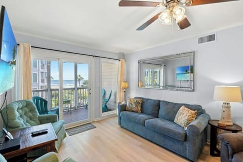 This comfy living room offers space for everyone to gather!