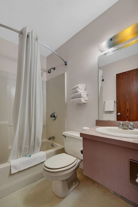 Clean, private ensuite bathroom with shower and amenities.