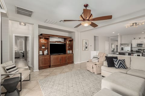 Comfortable space to watch a movie or read with soundbar, DVD's and books