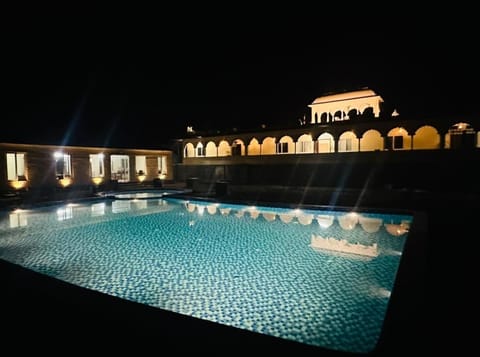 Outdoor pool, pool umbrellas, sun loungers