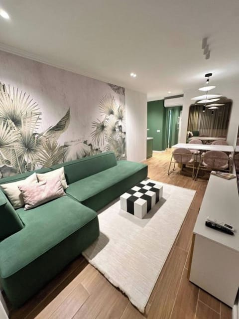 Apartment | Living area | 32-inch flat-screen TV with satellite channels