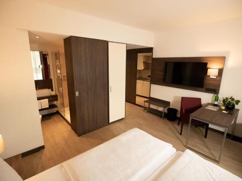 Deluxe Double Room, City View | In-room safe, individually furnished, desk, laptop workspace