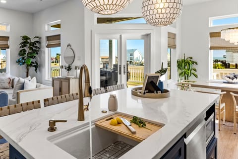 Kitchen bar seats four comfortably.