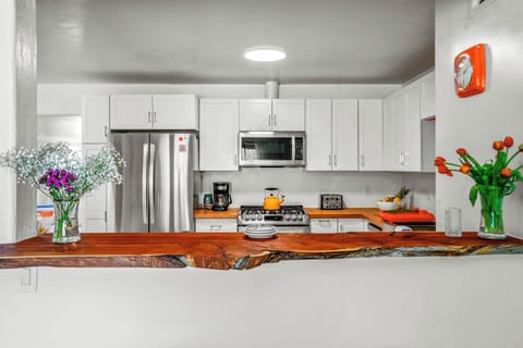 Fully equipped kitchen with quality cookware.