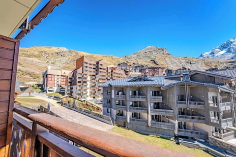 Panoramic mountain view from the balcony — stay close to lifts and the vast 3 Valleys ski area.