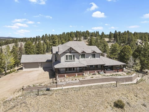 Elevated property view with natural beauty in every direction