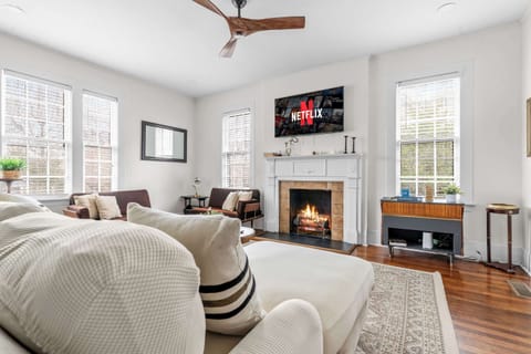 Bright Open-Concept Living Area with Natural Light and  Modern Comfort Seating!