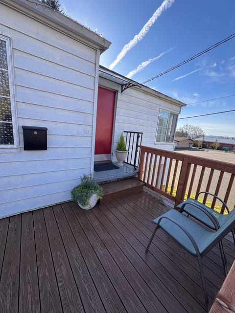 Front private entrance, parking spot in driveway