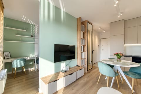 Comfort Apartment, Balcony, Courtyard View | Living room | TV
