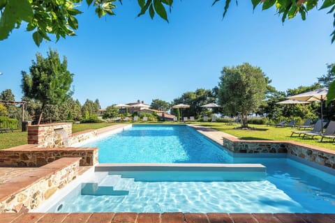 Blue, Swimming Pool, Tree, Resort, Garden, Water Feature, Eco Hotel, Estate, Landscaping, Shade