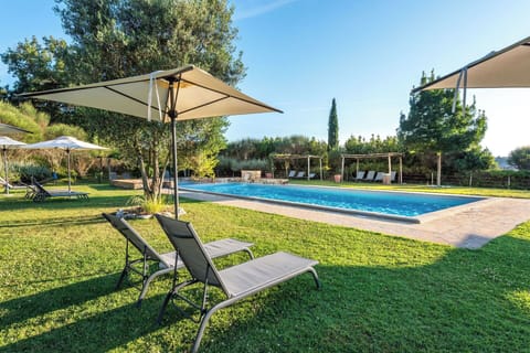 Blue, Swimming Pool, Garden, Outdoor Furniture, Shade, Lawn, Landscaping, Park, Resort, Sunlounger