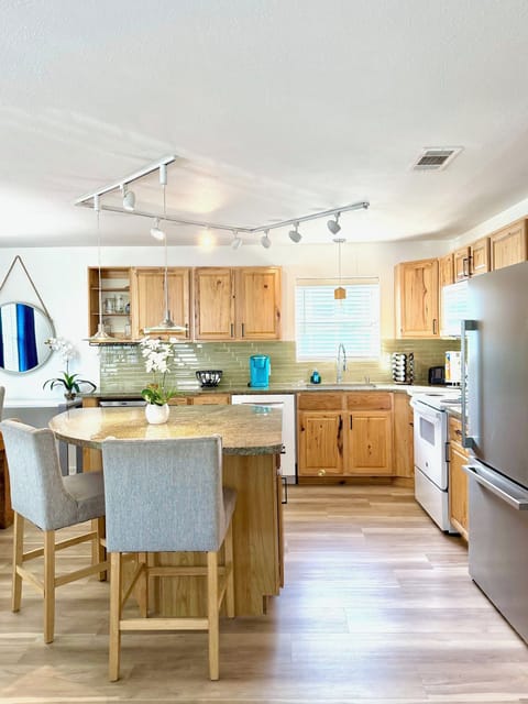 The upstairs kitchen has plenty of counter space for cooking and eating. 