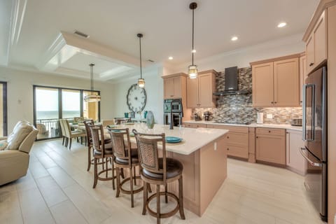 Open layout connects kitchen to dining