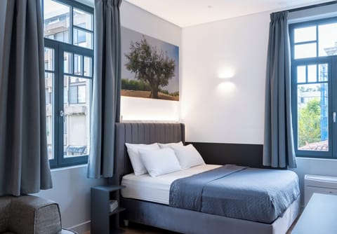 Senior Triple Room | Premium bedding, in-room safe, individually decorated