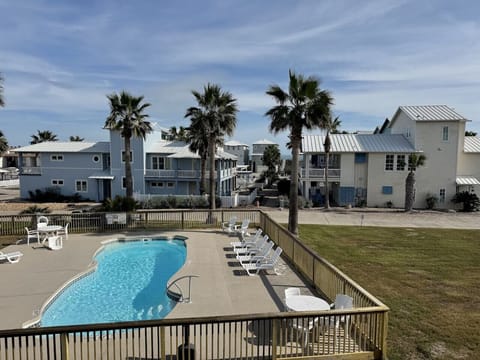 Resort-style pool with loungers 🏊‍♀️☀️